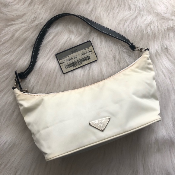 Prada Handbags - White Prada nylon pochette small bag